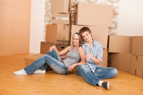Charity donation boxes and reusable furniture from a Hounslow clearance