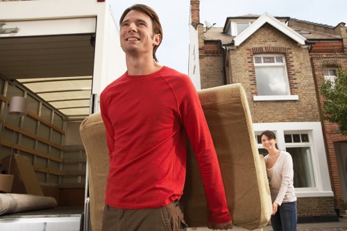 Packing boxes and wrapping household items for a Hounslow move