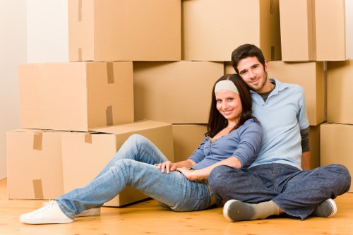 Family home relocation service with boxes and furniture ready to move