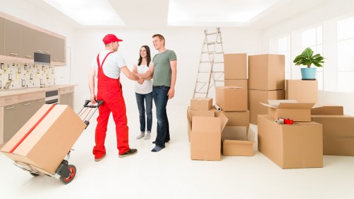 A mover assessing risks and planning safe handling for fragile items