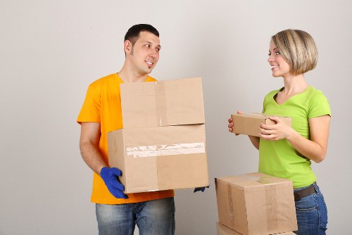 Unpacking boxes into a new home with room-by-room organisation